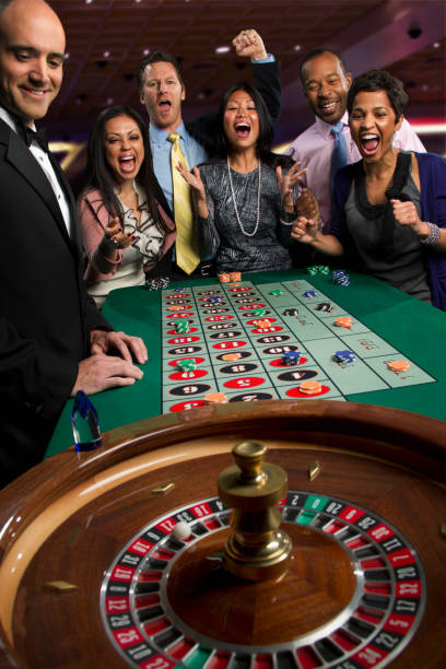 Live Casino Hold'em table with dealer and community cards displayed